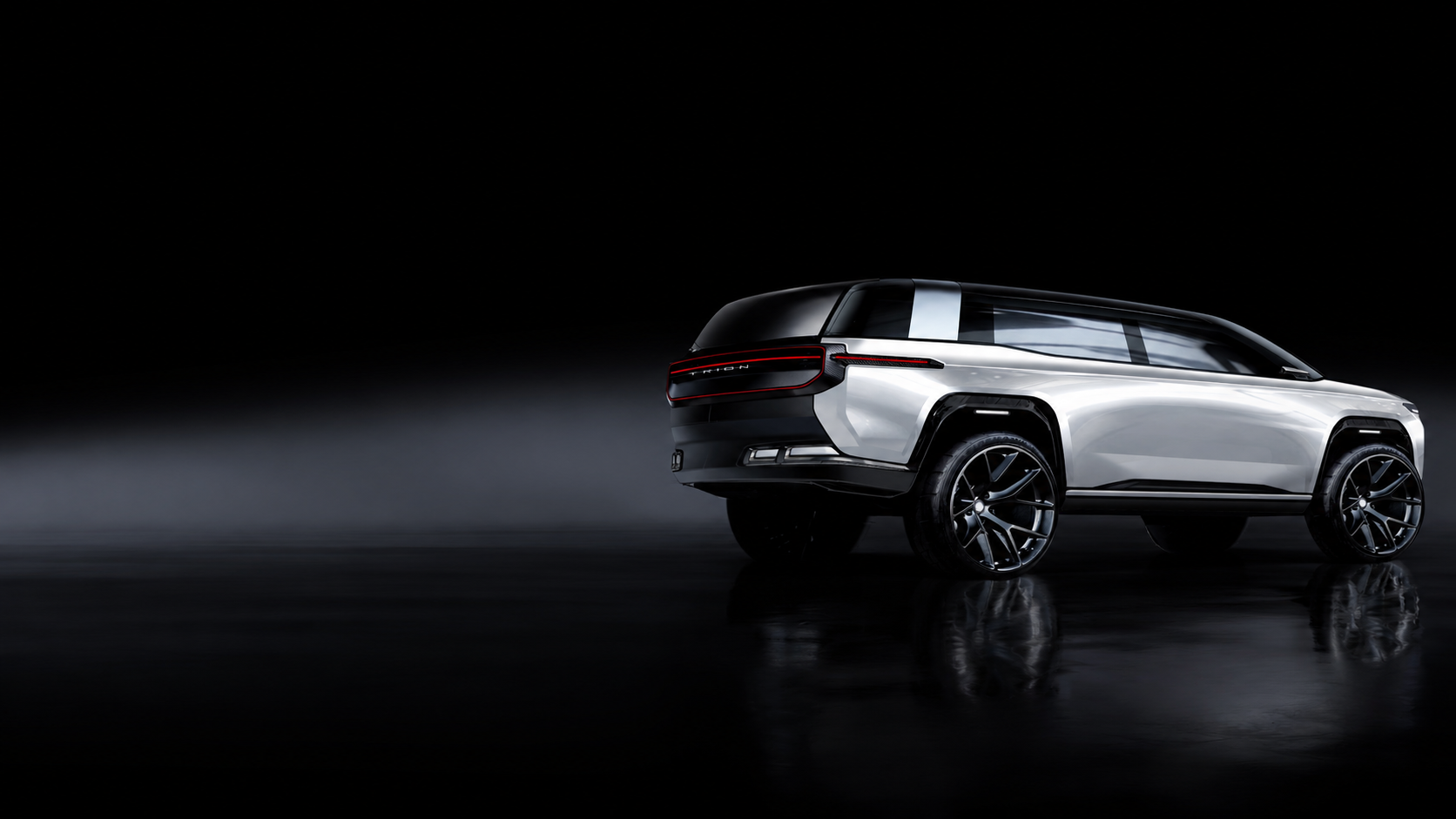 TRION Photon in studio with roof cargo box